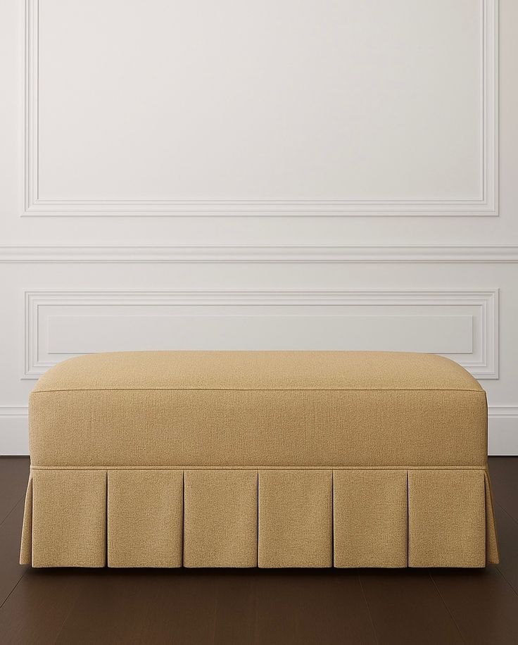 Boxed pleat ottoman with fixed cushion
